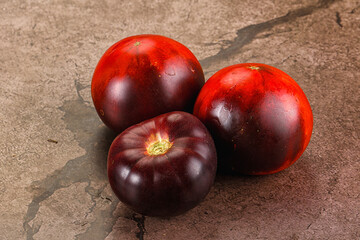 Black ripe juicy organic tomato