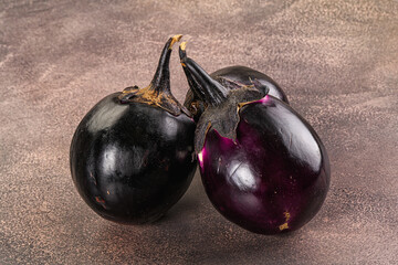 Raw violet and black eggplant