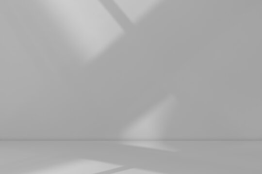 Minimal grey studio background with soft white sunlight,shadows on wall and floor,Interior room design for product mockup,presentation,website banner modern clean design backdrop for creative projects