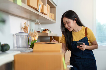 Entrepreneur organizing packages and managing inventory in a home office