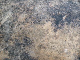 Cracked polished cement surface texture with natural imperfections.