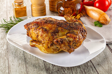 Baked in oven whole chicken with spices