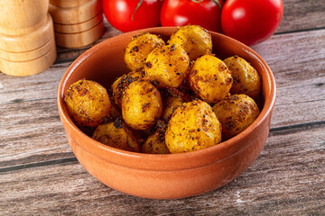 Baked small baby potato with herbs