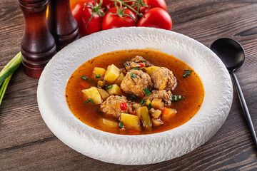 Tomato Soup with meatballs and vegetables