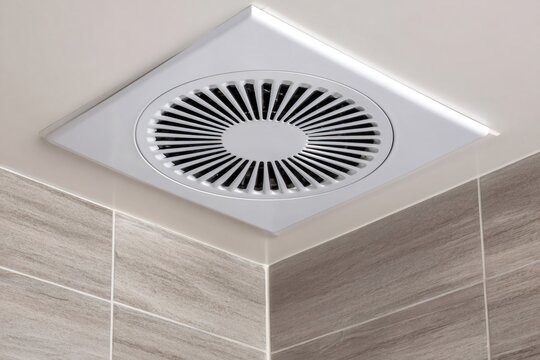 Plastic exhaust fan providing ventilation in modern bathroom