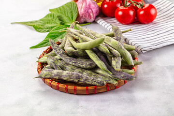 Raw green bean strips heap