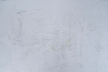 ざらざらの古い汚い壁のテクスチャー背景壁紙　凸凹の質感　傷ついた表面と張り付けたテープのあとの汚れ　アンティーク・ビンテージ