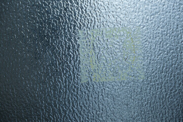 ざらざらの表面のすりガラスの表面　テープの跡　汚れた窓の表面