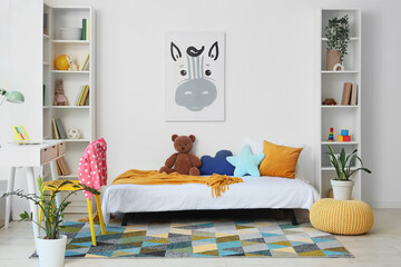 Interior of children's room with bed and bookshelves © Pixel-Shot