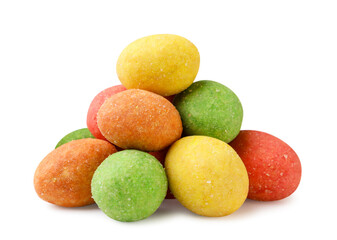 A pile of colorful wasabi peanuts close-up on a white. Isolated