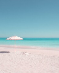 Pastel beach scene with a single pink umbrella