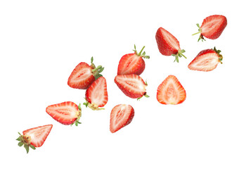 Cut fresh juicy strawberries falling on white background