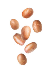 Fresh raw potatoes falling on white background