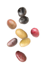 Different types of fresh potatoes falling on white background