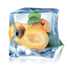 Ripe apricot fruits with green leaves in ice cube isolated on white. Frozen food