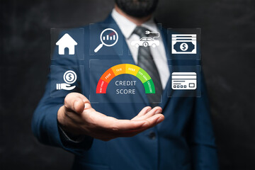 Credit score concept, businessman holding virtual screen of credit score icon for chart with credit...