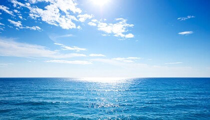 Obraz premium Sunny Day at Sea Peaceful Ocean View Under a Bright Blue Sky Clouds.