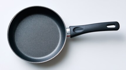Empty non stick frying pan on white background for cooking concepts