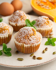 Pumpkin Muffins. A traditional fall recipe with fresh pumpkin, eggs, and flour.