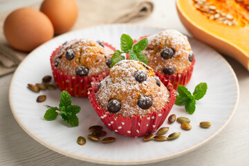 Pumpkin Chocolate Chip Muffins. A traditional fall recipe with fresh pumpkin, eggs, and flour.