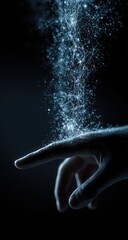 A hand, lit from within, appears to disperse a shimmering, liquid-like substance