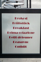 Stockholm, Sweden A sign in multiple languages at a cafe offers breakfast.