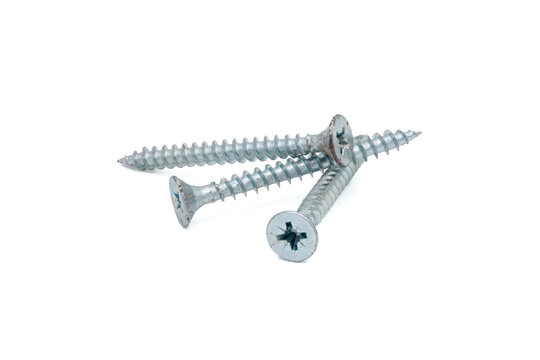 Three silver screws on white.