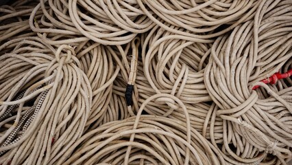 texture of stacked industrial ropes as a background