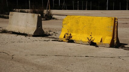 concrete roadblocks on a parking