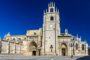 Main facade and bell tower of the Cathedral of San Antolin in Palencia seen from the square