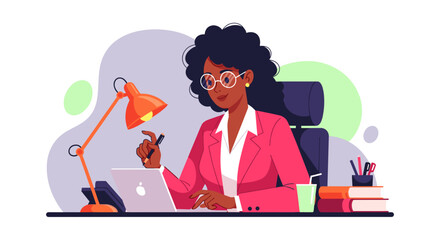 Fototapeta premium Professional African American businesswoman focused on her laptop at an office desk. Ideal for business, technology, or remote work concepts.