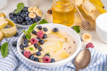 Sweet breakfast farina porridge with butter and fruits