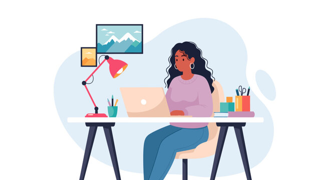 A focused woman works remotely on her laptop at a cozy home office desk. Ideal for concepts like productivity, online learning, creativity, business, and modern lifestyle.