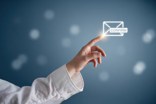 Email Confirmation Concept with Hand Touching a Glowing Envelope Icon on a Blue Background, Highlighting the Importance of Addressing Low Feedback