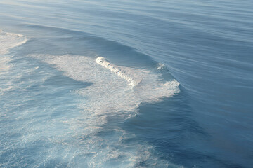 aerial photography of calm ocean surface showcasing tranquil textures and patterns of water