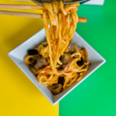Spaghetti on Chopsticks with Mushrooms and Greek Olives, Italian Vegetarian Cuisine