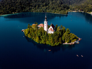 Aerial view by drone of Bled Island with the Church of the Assumption at dawn, Lake Bled, Upper Carniola, Slovenia, Europe.