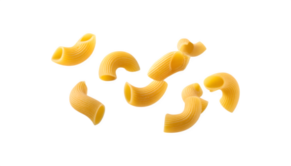 Seven uncooked macaroni pasta pieces suspended in midair
