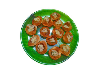 Panipuri or fuchka fuchka or gupchup or golgappa or Pani ke Patake on plate