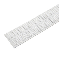 White pleated ribbon trim for sewing projects and fashion design embellishments on plain background