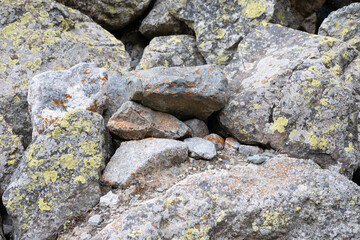 Mountain multi-colored stones on the slope