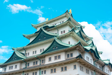 Close-up of traditional Japanese castle rooflines

