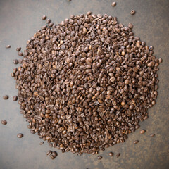 Roasted coffee beans on a black background. Selective focus.
