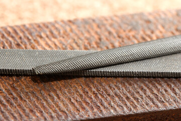 Crafting precision with metal tools on sturdy woodwork surface