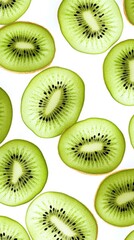 Fototapeta premium Fresh kiwi slices falling in midair isolated on white background for creative food photography