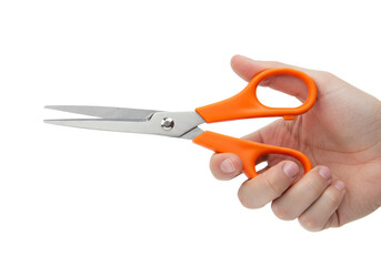 Hand holding scissors close up studio shot orange and silver transparent background