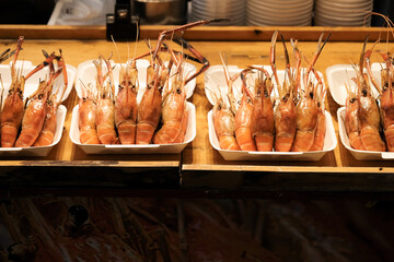 Grilled prawn on the box at a food stall street food.