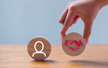 Cubes with handshake symbol. Business agreement between different parties. Business deal,...