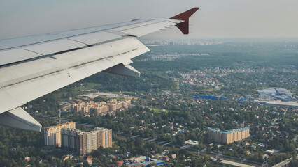 Aerial view of Moscow administrative district revealing residential buildings, schools, and green...