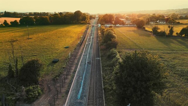 Train travelling in Ireland during sunset - Midleton, Cork.